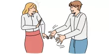 man grabbing at woman who is unhappy about it