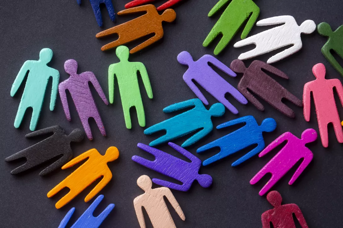 Different coloured wooden figures