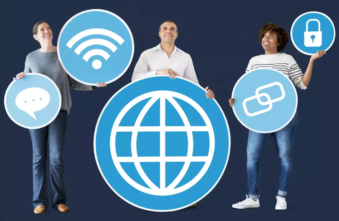 People standing holding symbols representing the internet