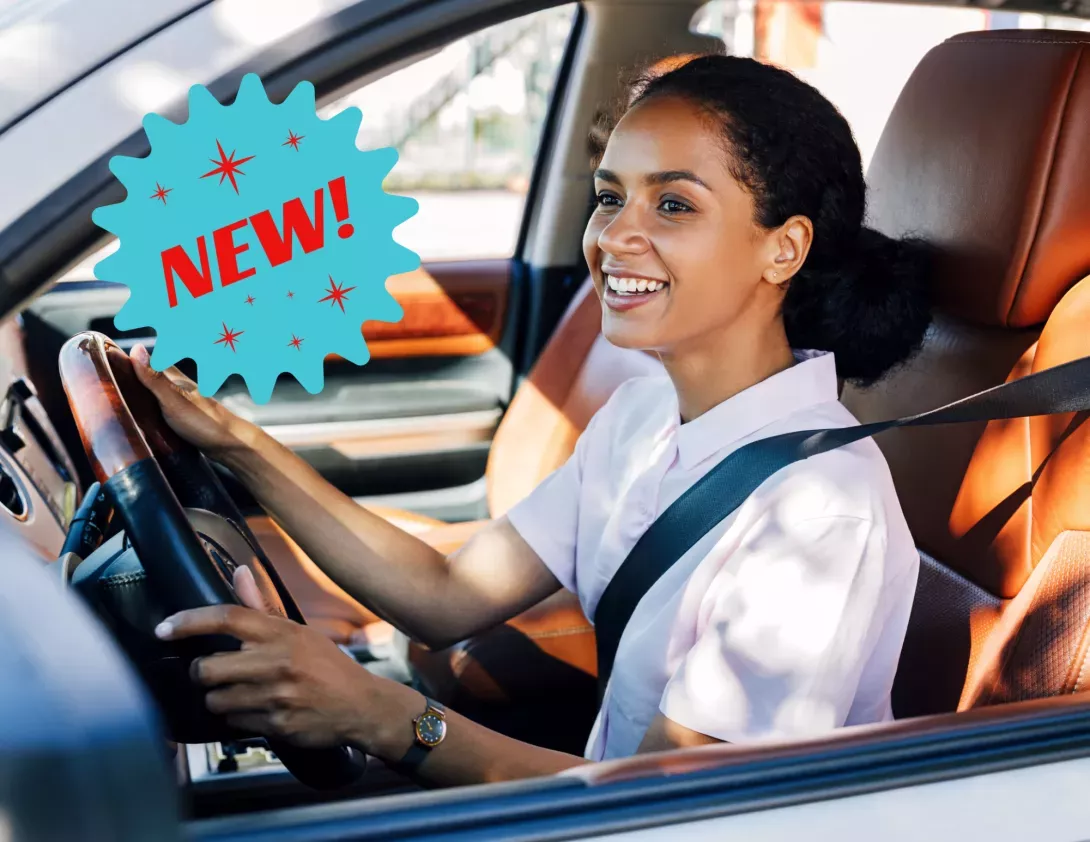 Young woman driving. word "NEW" overlaid. 